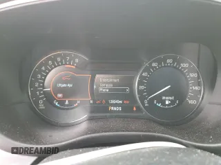 2015 Lincoln MKC z VIN 5LMCJ2A94FUJ10689, wystawiony jako Copart lot #49952045 z przebiegiem 128 040 mil mil oraz Szkoda całkowita • Salvage title. Historia ofert i sprzedaży dostępna na DreamBid. Obrazek 9.