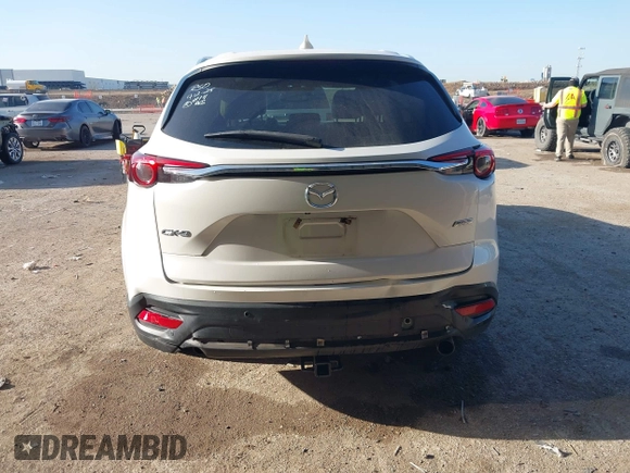 2016 Mazda CX-9 Grand Touring z VIN JM3TCADY6G0125547, wystawiony jako IAAI lot #41997445 z przebiegiem 129 179 mil mil oraz . Historia ofert i sprzedaży dostępna na DreamBid. Obrazek 16.