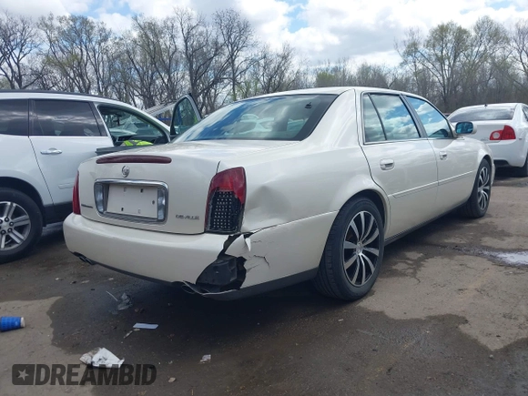 2003 Cadillac DeVille z VIN 1G6KD54Y13U208351, wystawiony jako IAAI lot #41889713 z przebiegiem 132 774 mil mil oraz . Historia ofert i sprzedaży dostępna na DreamBid. Obrazek 4.
