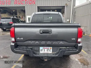 2021 Toyota Tacoma SR z VIN 5TFCZ5AN2MX279975, wystawiony jako IAAI lot #42477503 z przebiegiem 50 690 mil mil oraz . Historia ofert i sprzedaży dostępna na DreamBid. Obrazek 29.