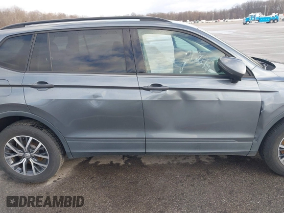 2021 Volkswagen Tiguan S with VIN 3VV1B7AX8MM016874, listed as a IAAI auction lot 41633090 with 76,857 mi miles and . Bid and sale history available at DreamBid. Image 6.