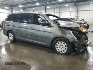 2008 Honda Odyssey LX с VIN 5FNRL38258B053974, выставлен на аукционе Copart как лот 57909535 с пробегом Не указан миль и На запчасти • Non repairable. История ставок и продаж доступна на DreamBid. Изображение 4.
