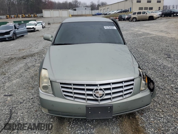 2006 Cadillac DTS 1SD z VIN 1G6KD57YX6U193025, wystawiony jako Copart lot #45784605 z przebiegiem Nie podano mil oraz Szkody całkowita. Historia ofert i sprzedaży dostępna na DreamBid. Obrazek 5.