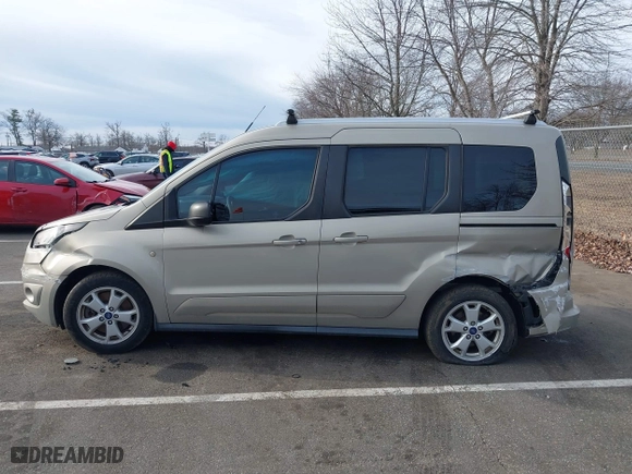 2015 Ford Transit Connect Wagon XLT with VIN NM0AE8F74F1179538, listed as a IAAI auction lot 41505221 with 57,798 mi miles. Bid and sale history available at carsss.com. Image 14.