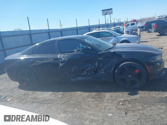 2020 Dodge Charger SXT with VIN 2C3CDXBG2LH229627, listed as a IAAI auction lot 41596342 with 124,012 mi miles and . Bid and sale history available at DreamBid. Image 13.