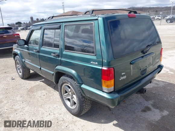 2000 Jeep Cherokee Classic with VIN 1J4FF58S3YL258755, listed as a IAAI auction lot 42020260 with 228,867 mi miles. Bid and sale history available at carsss.com. Image 3.