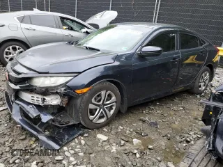 2017 Honda Civic LX z VIN 19XFC2F52HE024528, wystawiony jako Copart lot #57689185 z przebiegiem 80 109 mil mil oraz Szkoda całkowita • Salvage title. Historia ofert i sprzedaży dostępna na DreamBid. Obrazek 1.