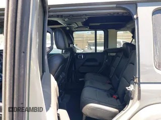 2023 Jeep Wrangler Rubicon with VIN 1C4JJXFG7PW541813, listed as a IAAI auction lot 42640045 with 53,645 mi miles and . Bid and sale history available at DreamBid. Image 8.