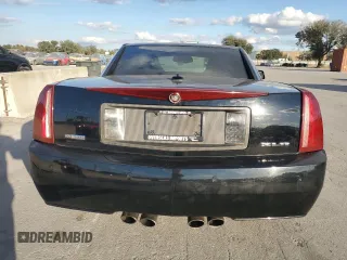 2004 Cadillac XLR z VIN 1G6YV34A945601976, wystawiony jako Copart lot #83062774 z przebiegiem 97 920 mil mil oraz Tytuł czysty. Historia ofert i sprzedaży dostępna na DreamBid. Obrazek 6.