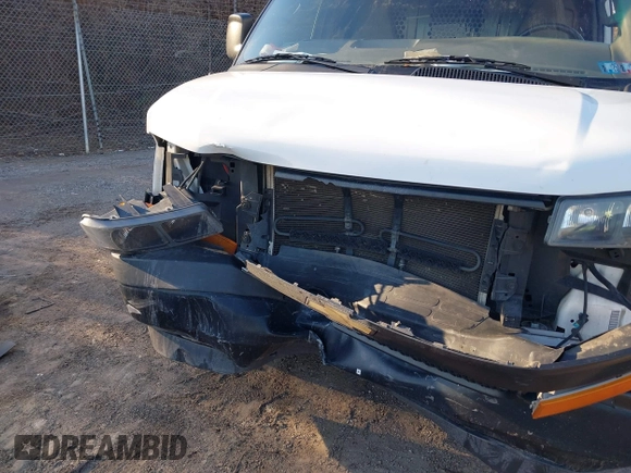 2018 Chevrolet Express Cargo Van with VIN 1GCWGAFG4J1338478, listed as a IAAI auction lot 41588218 with 88,990 mi miles. Bid and sale history available at carsss.com. Image 6.