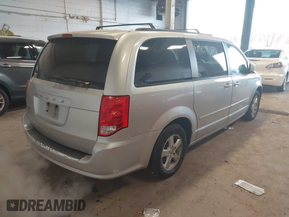 2012 Dodge Grand Caravan SXT with VIN 2C4RDGCG8CR139087, listed as a IAAI auction lot 41090171 with 202,461 mi miles and . Bid and sale history available at DreamBid. Image 4.