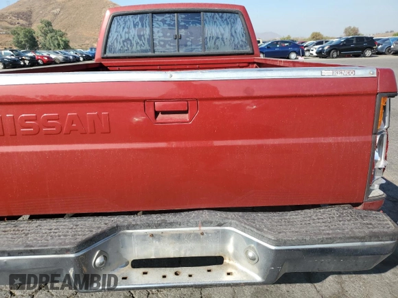 1989 Nissan Hardbody z VIN 1N6ND11S0KC342434, wystawiony jako Copart lot #71089274 z przebiegiem 300 076 mil mil oraz Szkody całkowita. Historia ofert i sprzedaży dostępna na DreamBid. Obrazek 10.