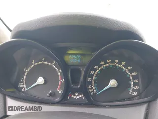 2014 Ford Fiesta S with VIN 3FADP4TJ6EM241516, listed as a IAAI auction lot 42340020 with 189,848 mi miles and . Bid and sale history available at DreamBid. Image 7.