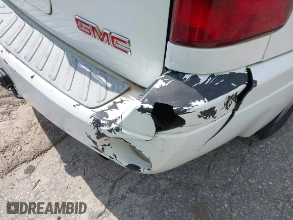 2003 GMC Envoy SLE with VIN 1GKES16S136153880, listed as a IAAI auction lot 42009798 with 289,208 mi miles and . Bid and sale history available at DreamBid. Image 14.