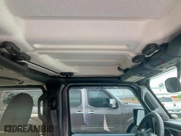 2023 Jeep Gladiator Sport S с VIN 1C6HJTAG6PL560425, выставлен на аукционе Copart как лот 67550135 с пробегом 16 967 миль миль и Чистый • Clean title. История ставок и продаж доступна на DreamBid. Изображение 14.