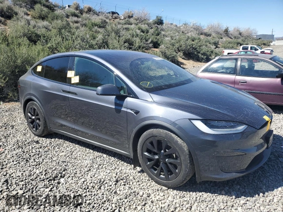 2023 Tesla Model X with VIN 7SAXCAE52PF380229, listed as a Copart auction lot 53535065 with 42,456 mi miles and Salvage Title. Bid and sale history available at DreamBid. Image 4.