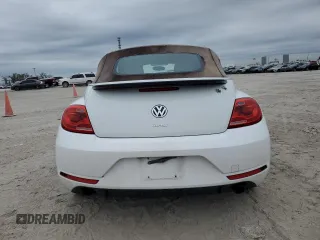 2013 Volkswagen Beetle with VIN 3VW7S7AT9DM816943, listed as a Copart auction lot 88466695 with 77,265 mi miles and Salvage Title. Bid and sale history available at DreamBid. Image 6.