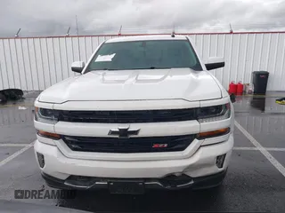 2018 Chevrolet Silverado 1500 LT with VIN 3GCUKREC5JG595959, listed as a IAAI auction lot 41608507 with 117,824 mi miles. Bid and sale history available at carsss.com. Image 12.