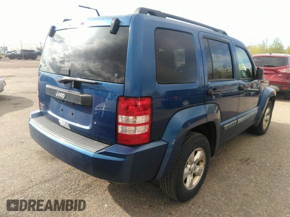 2010 Jeep Liberty Sport with VIN 1J4PN2GK3AW109144, listed as a IAAI auction lot 42135585 with 121,740 mi miles. Bid and sale history available at carsss.com. Image 4.