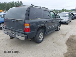 2003 Chevrolet Tahoe LT with VIN 1GNEK13Z33J114144, listed as a IAAI auction lot 42470562 with 249,813 mi miles and . Bid and sale history available at DreamBid. Image 4.