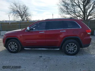 2014 Jeep Grand Cherokee Limited with VIN 1C4RJFBG7EC218735, listed as a IAAI auction lot 41265513 with 174,957 mi miles. Bid and sale history available at carsss.com. Image 14.