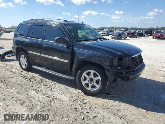 2007 GMC Envoy SLE with VIN 1GKDS13S472107120, listed as a Copart auction lot 42393475 with 106,499 mi miles and Salvage Title. Bid and sale history available at carsss.com. Image 4.
