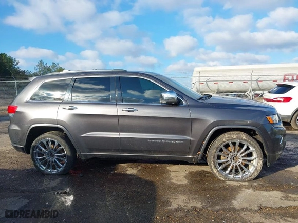 2014 Jeep Grand Cherokee Overland with VIN 1C4RJFCT8EC183165, listed as a IAAI auction lot 41298114 with 114,187 mi miles. Bid and sale history available at carsss.com. Image 13.