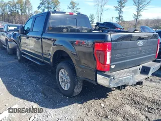 2021 Ford Super Duty F-250 SRW XL with VIN 1FT7W2B61MEE02841, listed as a IAAI auction lot 41454119 with 54,703 mi miles. Bid and sale history available at carsss.com. Image 3.