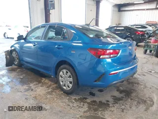 2021 Kia Rio S with VIN 3KPA24AD7ME364789, listed as a IAAI auction lot 42044676 with 54,072 mi miles and . Bid and sale history available at DreamBid. Image 3.