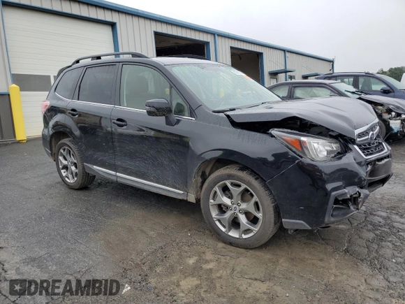 2017 Subaru Forester Touring with VIN JF2SJATC7HH437543, listed as a Copart auction lot 60866985 with 50,532 mi miles and Salvage title. Bid and sale history available at DreamBid. Image 4.