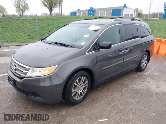 2012 Honda Odyssey EX-L with VIN 5FNRL5H6XCB032366, listed as a IAAI auction lot 41943625 with 73,236 mi miles and . Bid and sale history available at carsss.com. Image 2.