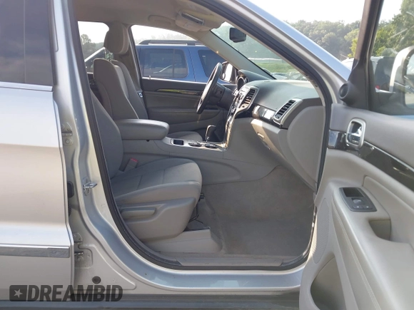 2011 Jeep Grand Cherokee Laredo with VIN 1J4RR4GG2BC514497, listed as a IAAI auction lot 42688206 with 88,822 mi miles and . Bid and sale history available at DreamBid. Image 5.