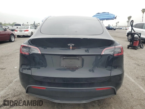 2024 Tesla Model Y с VIN 7SAYGDED4RF045915, выставлен на аукционе Copart как лот 55170415 с пробегом 13 234 миль миль и Списание • Salvage title. История ставок и продаж доступна на DreamBid. Изображение 6.