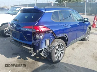2022 Toyota Corolla Cross XLE with VIN 7MUDAAAG7NV024323, listed as a IAAI auction lot 42643048 with 76,465 mi miles and . Bid and sale history available at DreamBid. Image 4.
