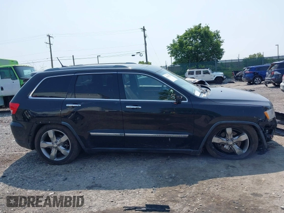 2011 Jeep Grand Cherokee Overland with VIN 1J4RR6GT3BC574037, listed as a IAAI auction lot 42411532 with 158,765 mi miles and . Bid and sale history available at DreamBid. Image 14.