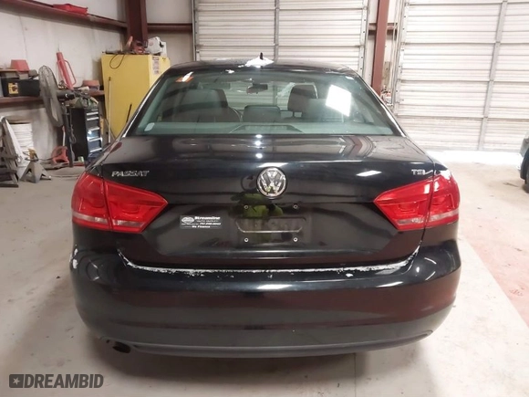 2015 Volkswagen Passat 1.8T Limited Edition with VIN 1VWAS7A3XFC106265, listed as a IAAI auction lot 41395326 with 112,239 mi miles. Bid and sale history available at carsss.com. Image 16.