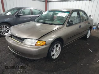 1998 Mazda Protege DX with VIN JM1BC141XW0200689, listed as a IAAI auction lot 41540162 with 172,311 mi miles and . Bid and sale history available at DreamBid. Image 17.