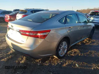 2013 Toyota Avalon XLE with VIN 4T1BK1EB2DU067941, listed as a IAAI auction lot 41321943 with 159,524 mi miles and . Bid and sale history available at DreamBid. Image 4.