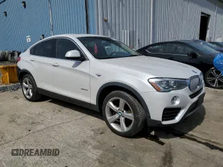 2015 BMW X4 xDrive28i with VIN 5UXXW3C59F0F89517, listed as a Copart auction lot 49989304 with 65,554 mi miles. Bid and sale history available at carsss.com. Image 4.