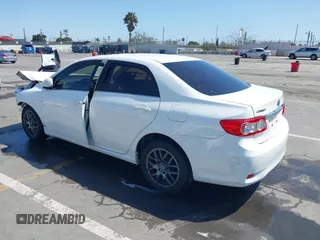 2013 Toyota Corolla L with VIN JTDBU4EE1DJ116557, listed as a IAAI auction lot 41981691 with 169,898 mi miles. Bid and sale history available at carsss.com. Image 3.
