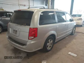 2012 Dodge Grand Caravan SXT with VIN 2C4RDGCG8CR139087, listed as a IAAI auction lot 41090171 with 202,461 mi miles and . Bid and sale history available at DreamBid. Image 4.
