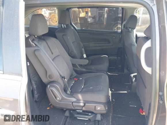 2020 Honda Odyssey EX with VIN 5FNRL6H59LB068868, listed as a IAAI auction lot 41930832 with 64,872 mi miles and . Bid and sale history available at DreamBid. Image 8.