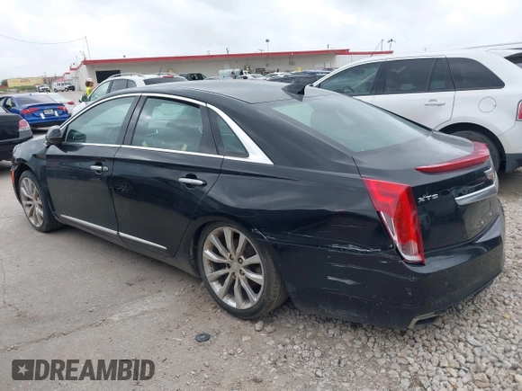 2017 Cadillac XTS Luxury z VIN 2G61M5S32H9158776, wystawiony jako IAAI lot #42528442 z przebiegiem 90 680 mil mil oraz . Historia ofert i sprzedaży dostępna na DreamBid. Obrazek 13.