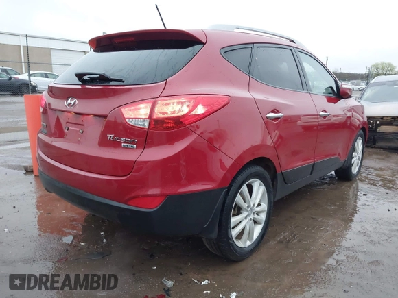 2013 Hyundai Tucson GLS with VIN KM8JU3AC8DU683546, listed as a IAAI auction lot 41956167 with 141,510 mi miles. Bid and sale history available at carsss.com. Image 4.