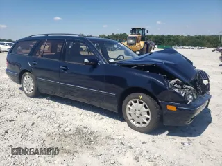 2001 Mercedes-Benz E-Class AWD with VIN WDBJH82J91X057063, listed as a Copart auction lot 70235274 with 174,846 mi miles and Salvage Title. Bid and sale history available at carsss.com. Image 4.