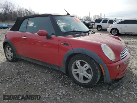2005 MINI Convertible with VIN WMWRF33525TG12494, listed as a Copart auction lot 43010175 with Not provided miles and Salvage title. Bid and sale history available at DreamBid. Image 4.