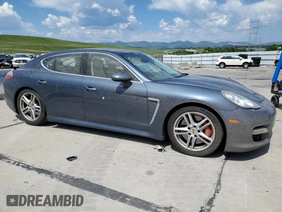 2010 Porsche Panamera Turbo with VIN WP0AC2A70AL090897, listed as a Copart auction lot 60986335 with 120,334 mi miles and Salvage title. Bid and sale history available at DreamBid. Image 4.