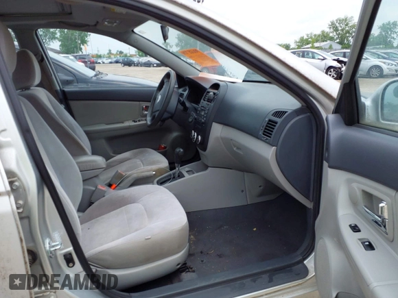 2009 Kia Spectra EX with VIN KNAFE221995613874, listed as a IAAI auction lot 42467453 with 104,158 mi miles and . Bid and sale history available at DreamBid. Image 5.