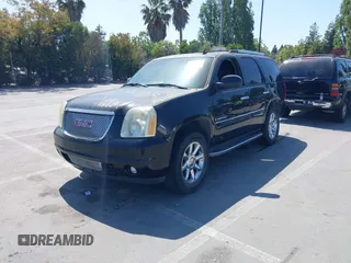 2007 GMC Yukon Denali z VIN 1GKFK63877J285149, wystawiony jako IAAI lot #42418510 z przebiegiem 140 863 mil mil oraz . Historia ofert i sprzedaży dostępna na DreamBid. Obrazek 2.