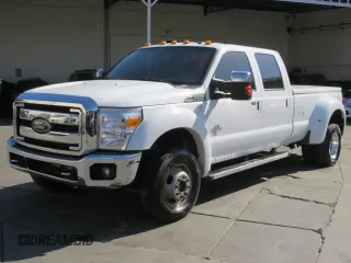 2012 Ford F-450 XL with VIN 1FT8W4DTXCEB96713, listed as a Copart auction lot 71784504 with 220,911 mi miles and Salvage Title. Bid and sale history available at carsss.com. Image 2.